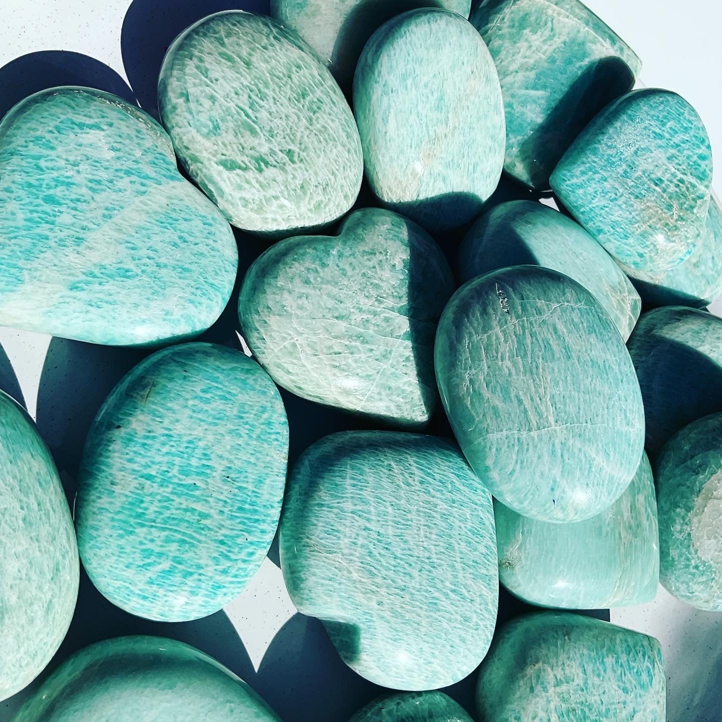 Amazonite hearts and palmstones